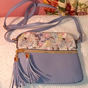 BLUE CROSSBODY PURSE WITH PINK FLOWERS, TASSILS AND GOLD HARDWARE